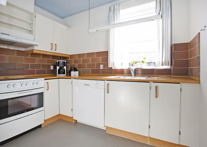 Lägenhet Feriecentret Osterso Faergegard *